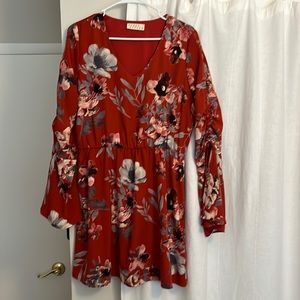 Festive fall lined dress with bell sleeves and cinched waist.